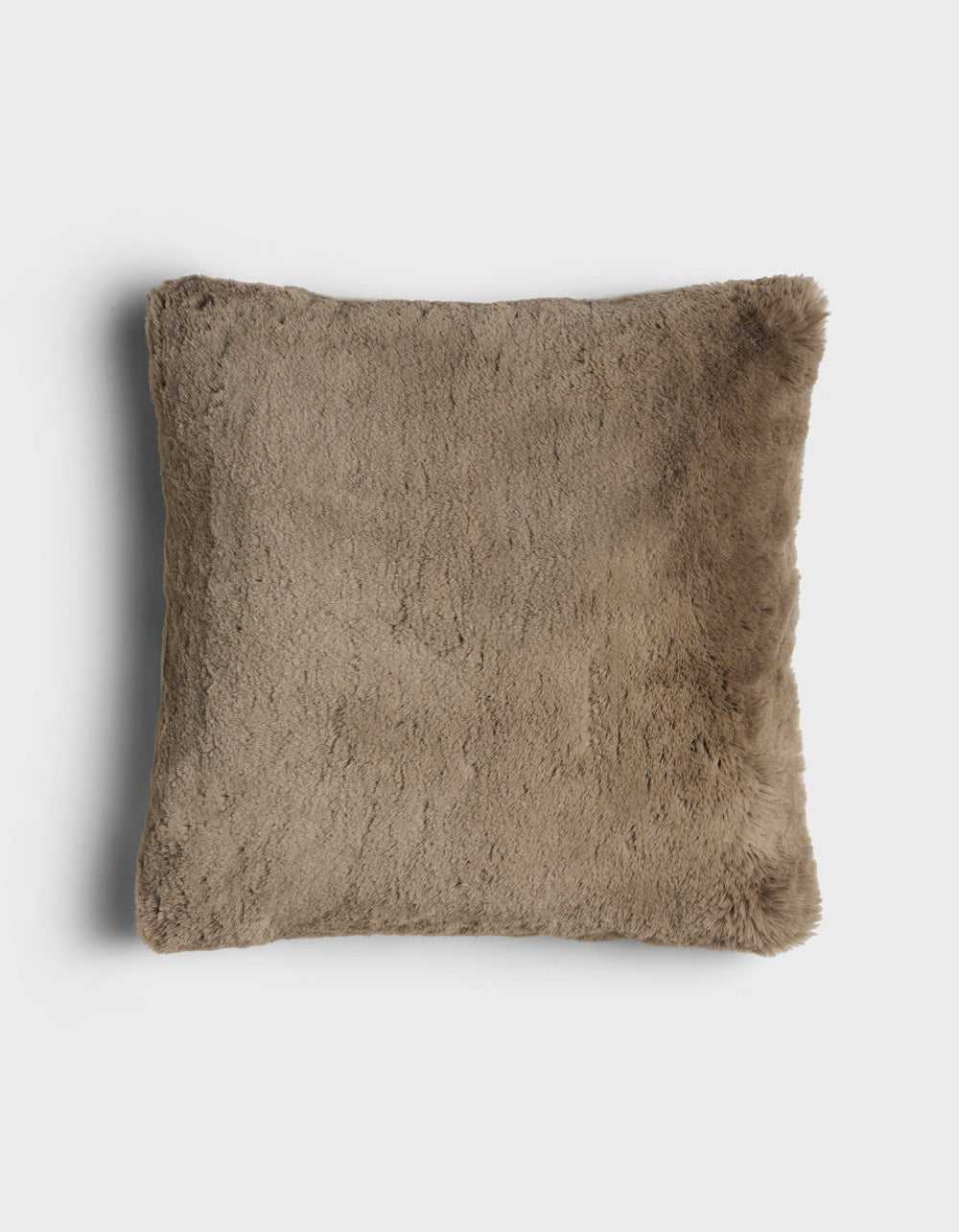 The Cuddle Pillow by Cozy Earth is a square, brown faux fur pillow with a soft, fluffy texture, displayed on a plain white background.|Color:Walnut