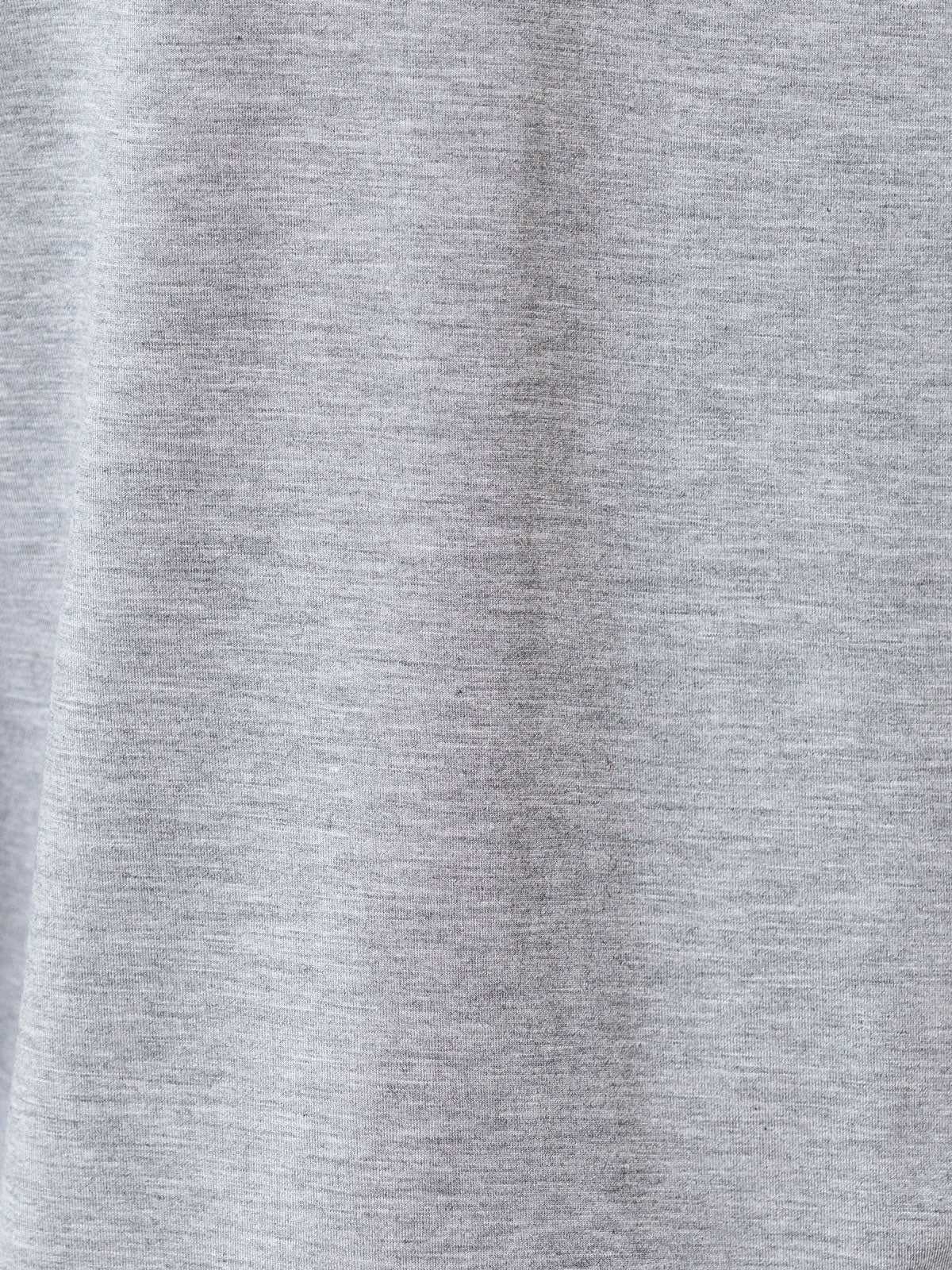 Grey Long Sleeve Pajama Set. The photo was taken close up, showing off the print of the pajamas. |Color:Grey