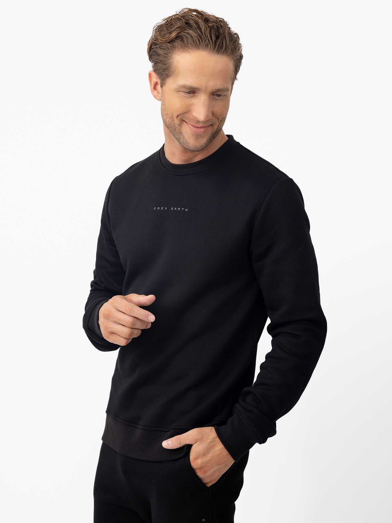 Man wearing black cityscape pullover with white background |Color:Black