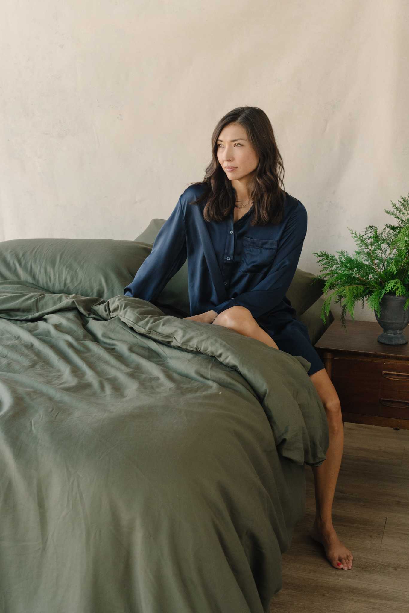 Olive Duvet Cover and comforter resting on a bed. |Color: Olive