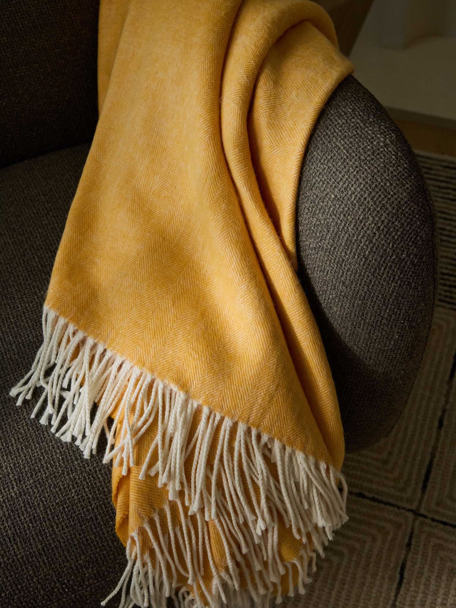 Sunflower herringbone tassel throw draped over recliner |Color:Sunflower