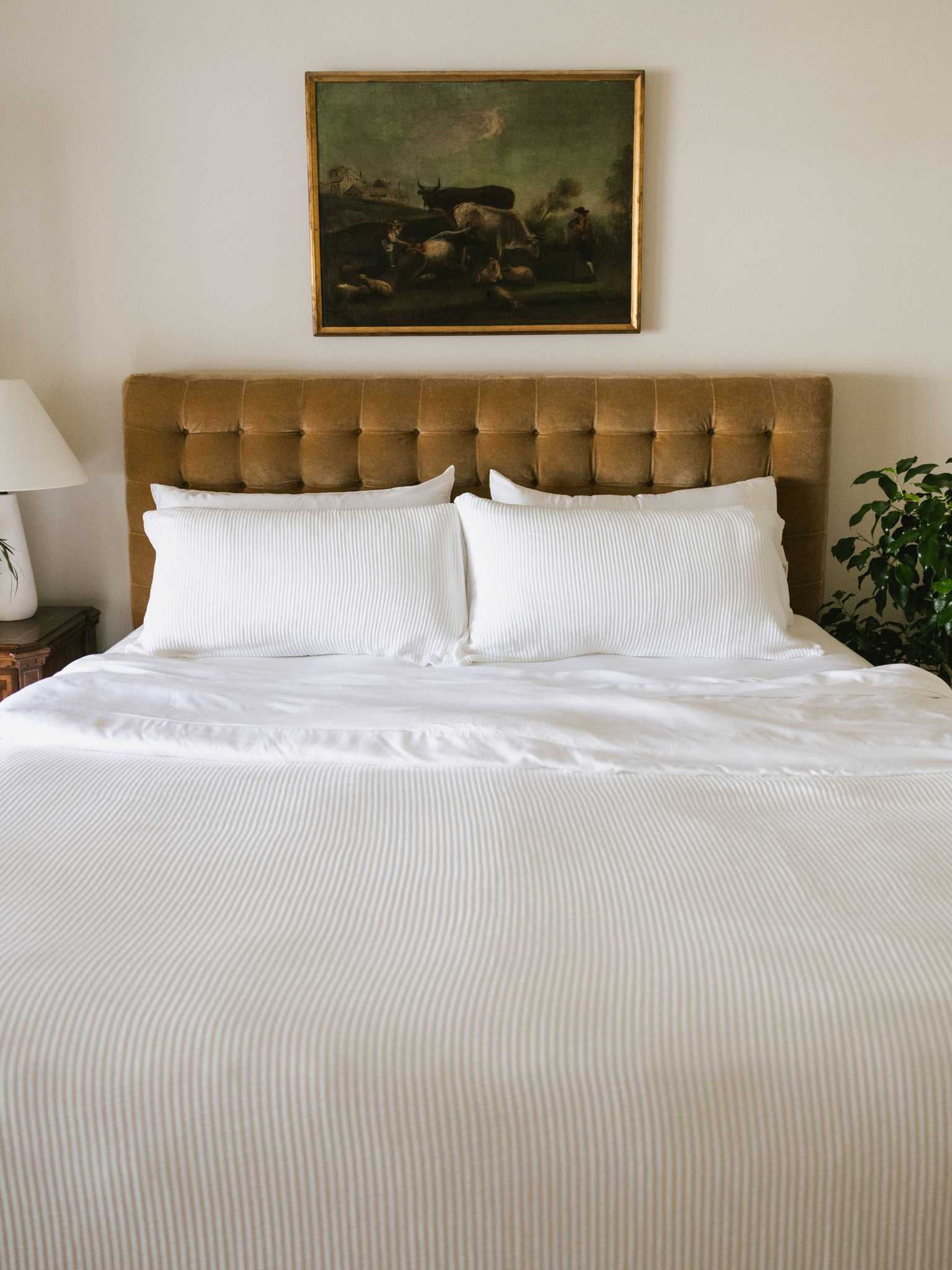 White coverlet and shams on a bed |Color:White