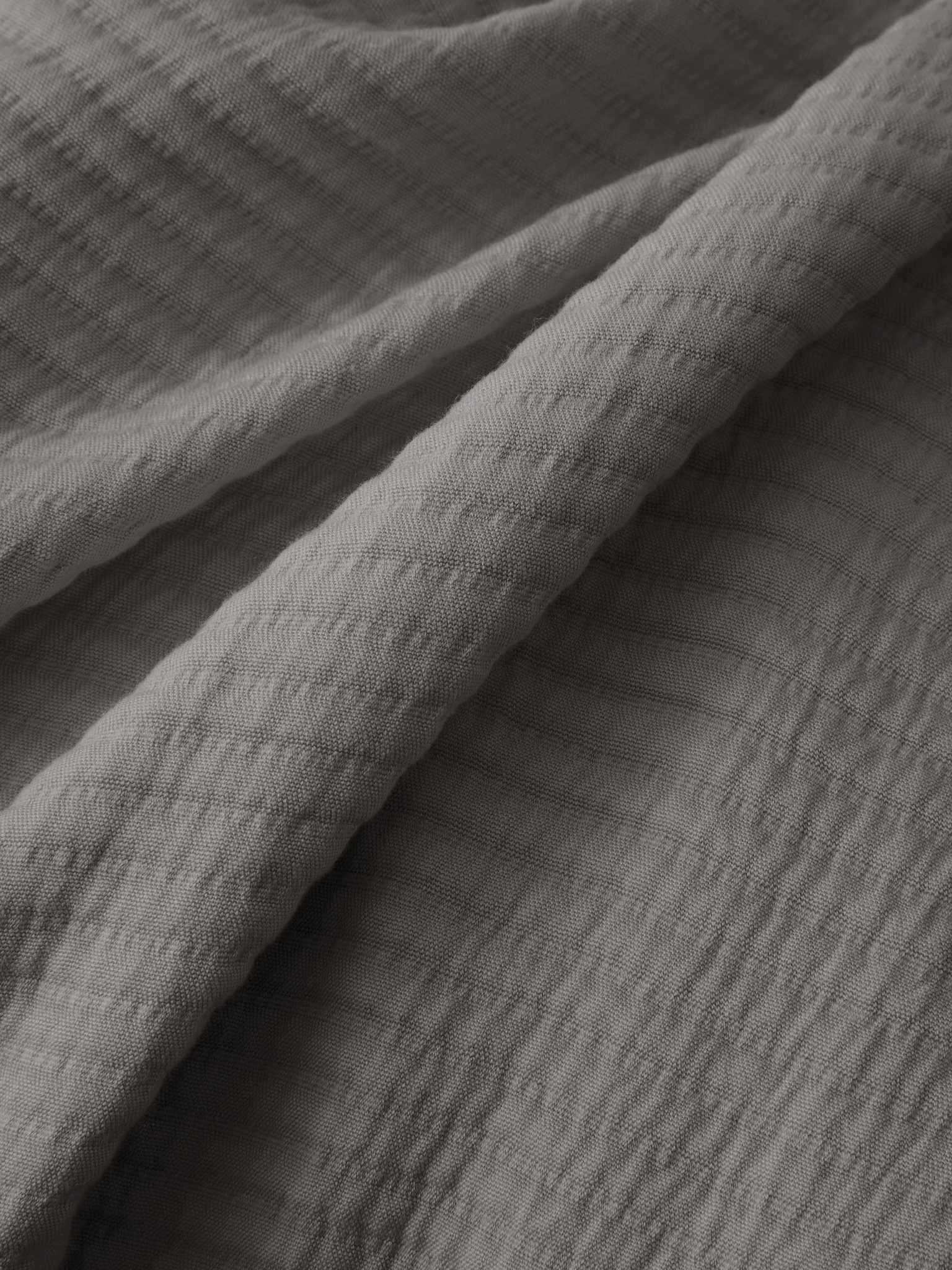 Close up of charcoal coverlet fabric |Color:Charcoal