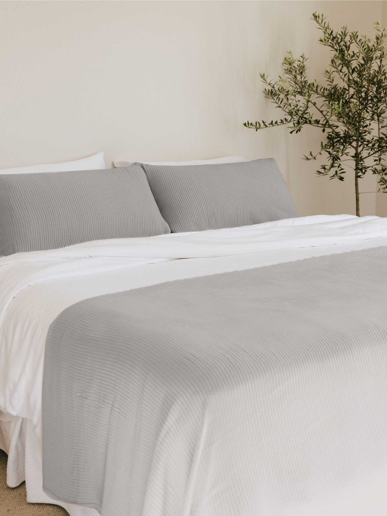 Light Grey coverlet and shams on a bed |Color:Light Grey