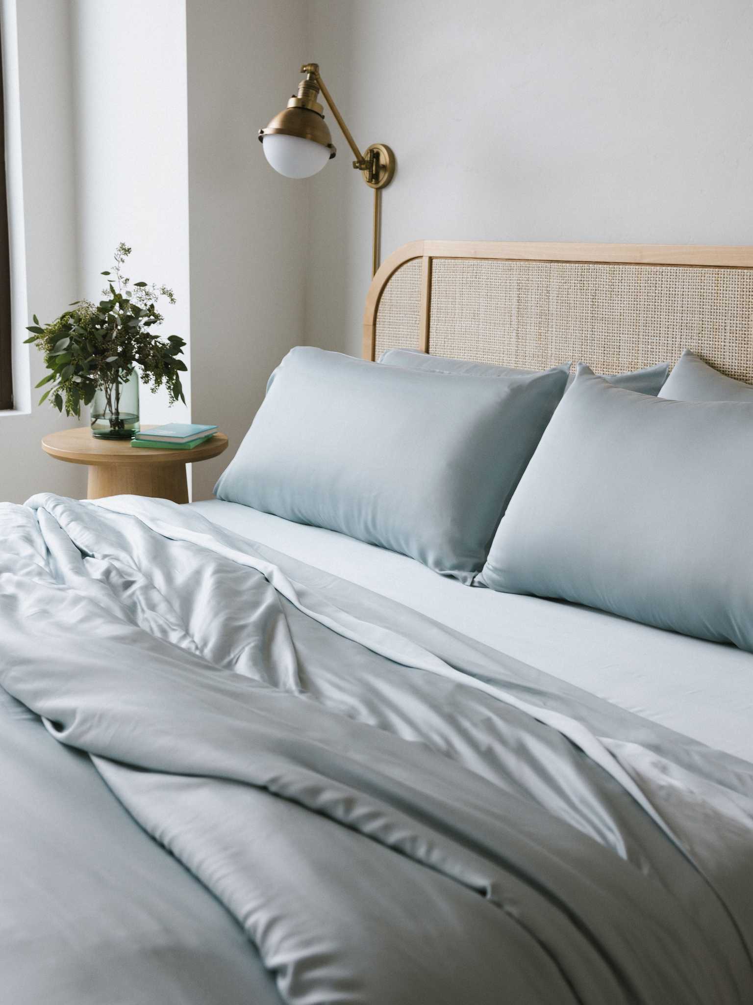 Partially made bed with shore bedding |Color:Shore