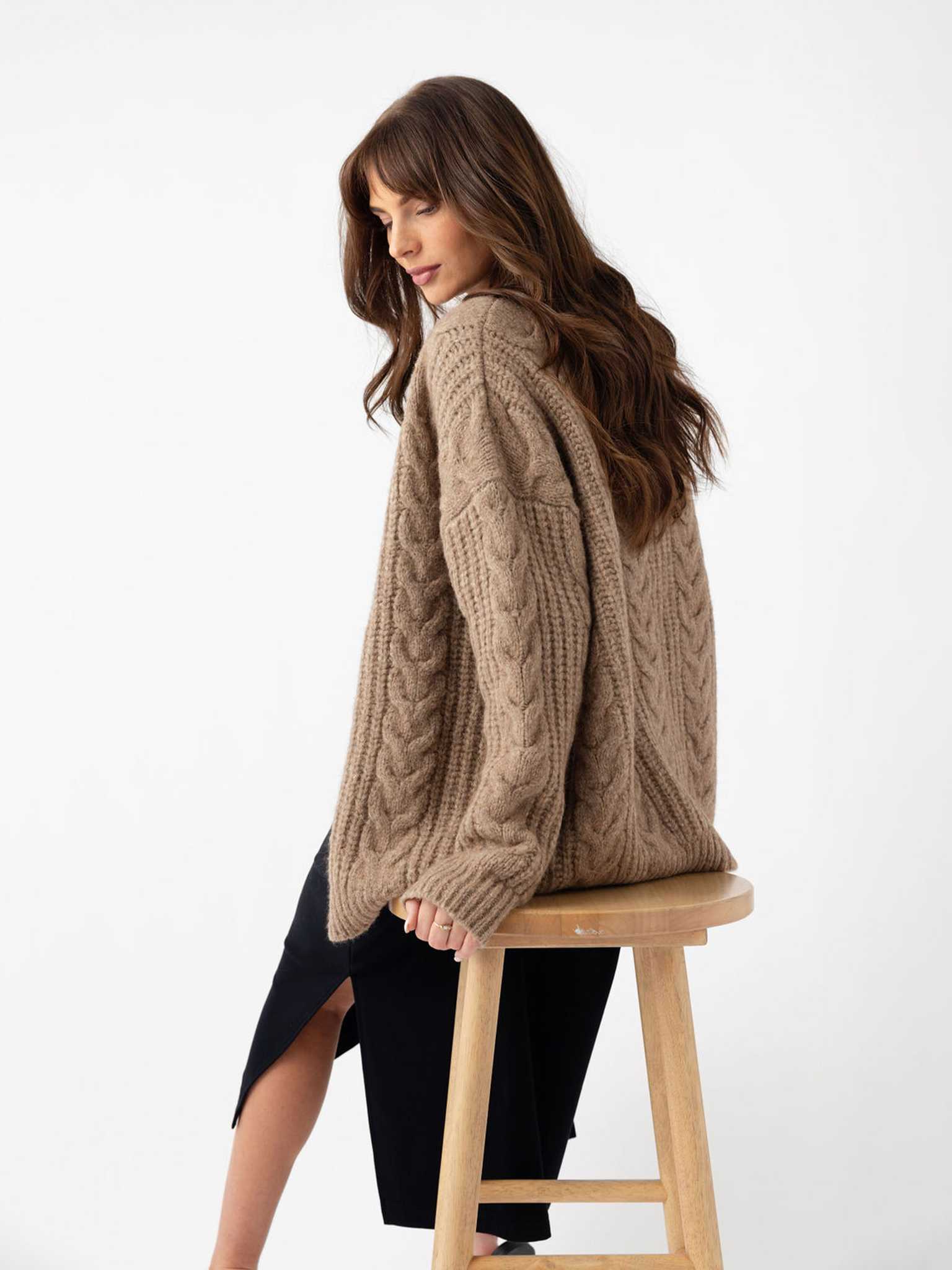 Back of woman sitting on wooden stool wearing mushroom cardigan |Color:Mushroom