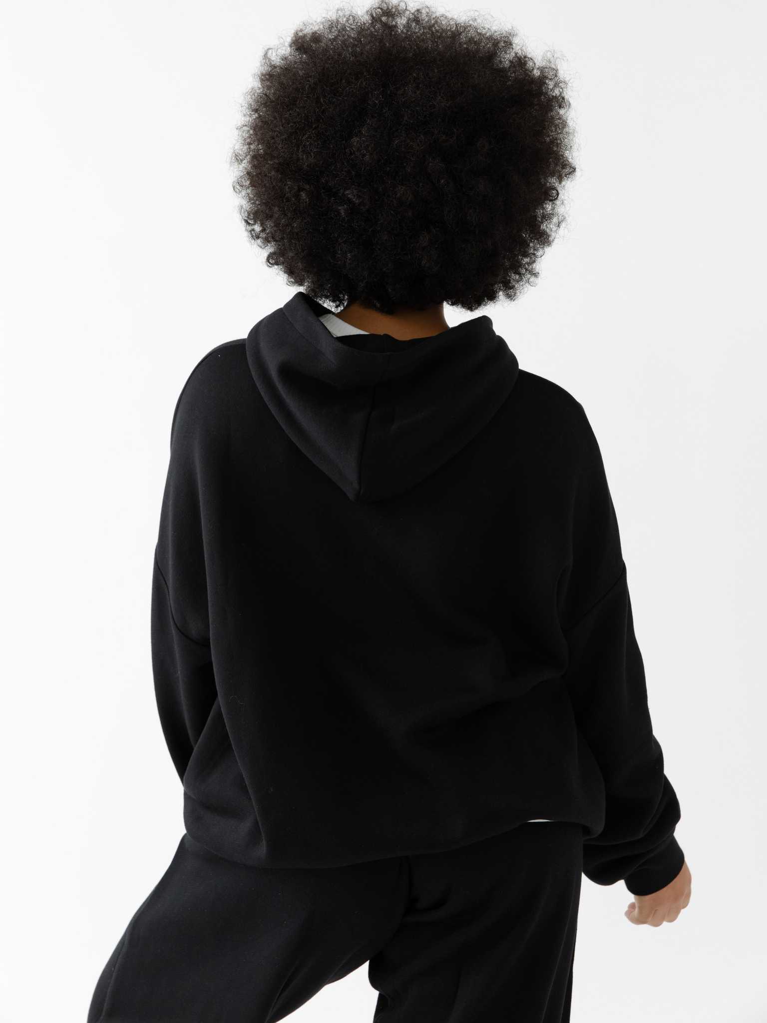 Back of woman wearing black cityscape hoodie |Color:Black