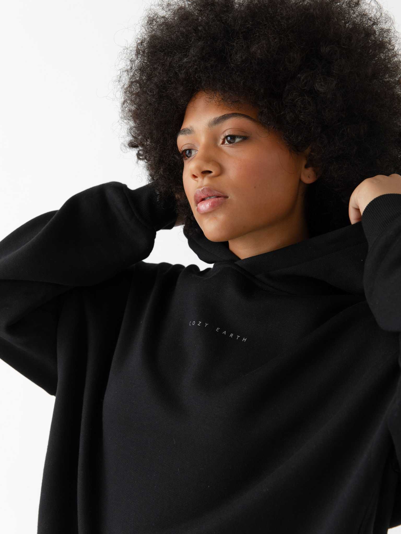 Close up of woman wearing black cityscape hoodie |Color:Black