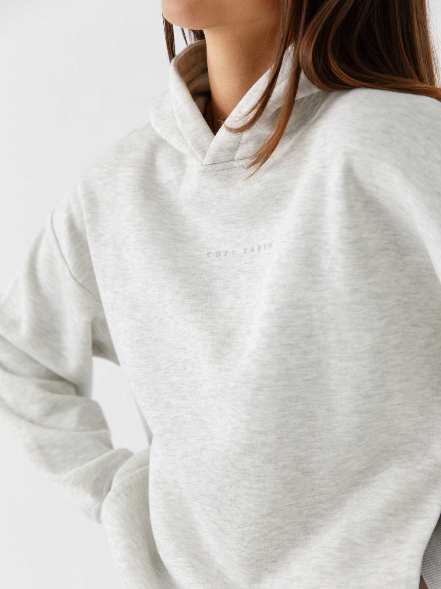 Close up of woman wearing heather grey cityscape hoodie |Color:Heather Grey