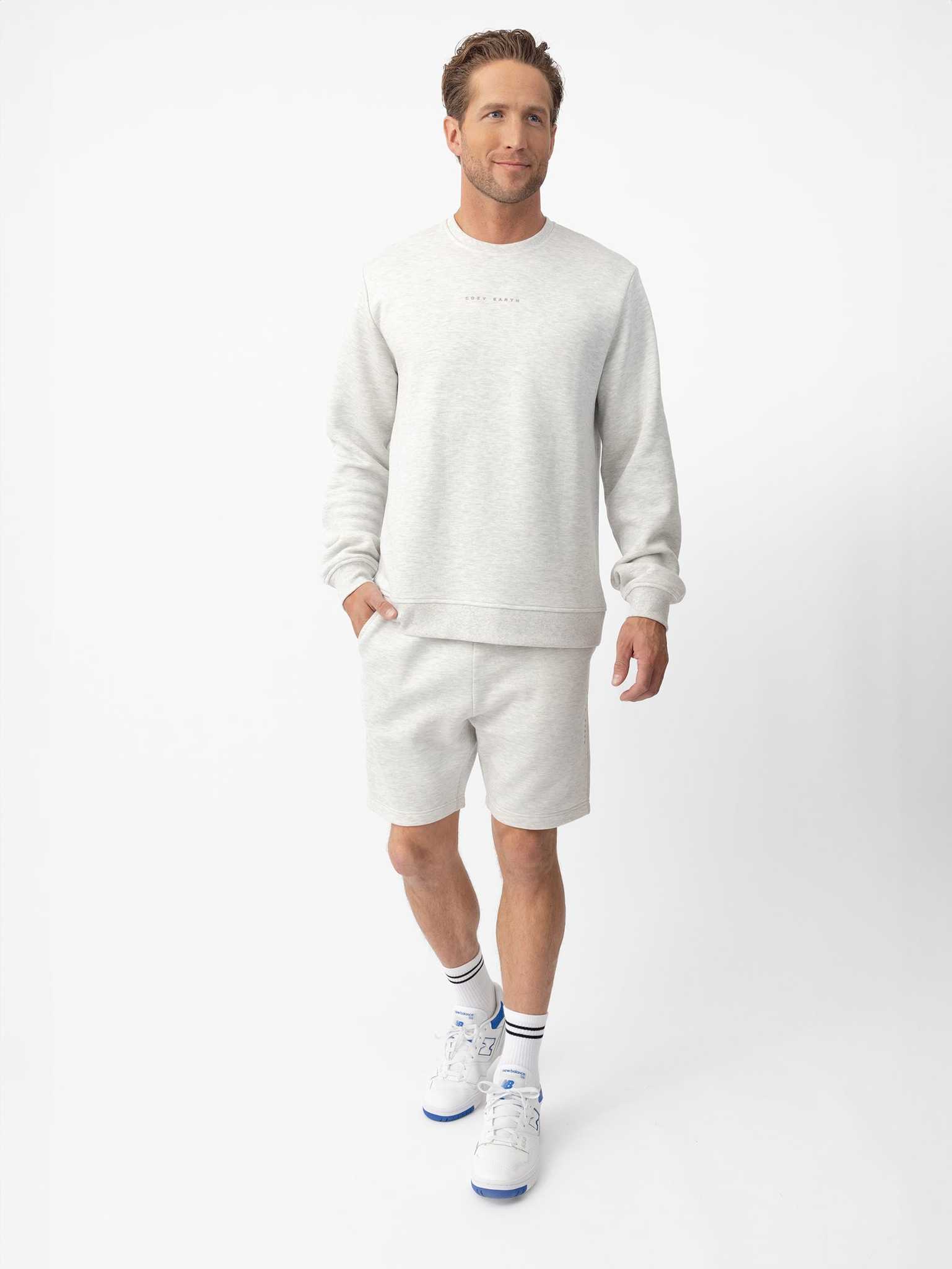Man wearing heather grey cityscape shorts and pullover with white background |Color:Heather Grey