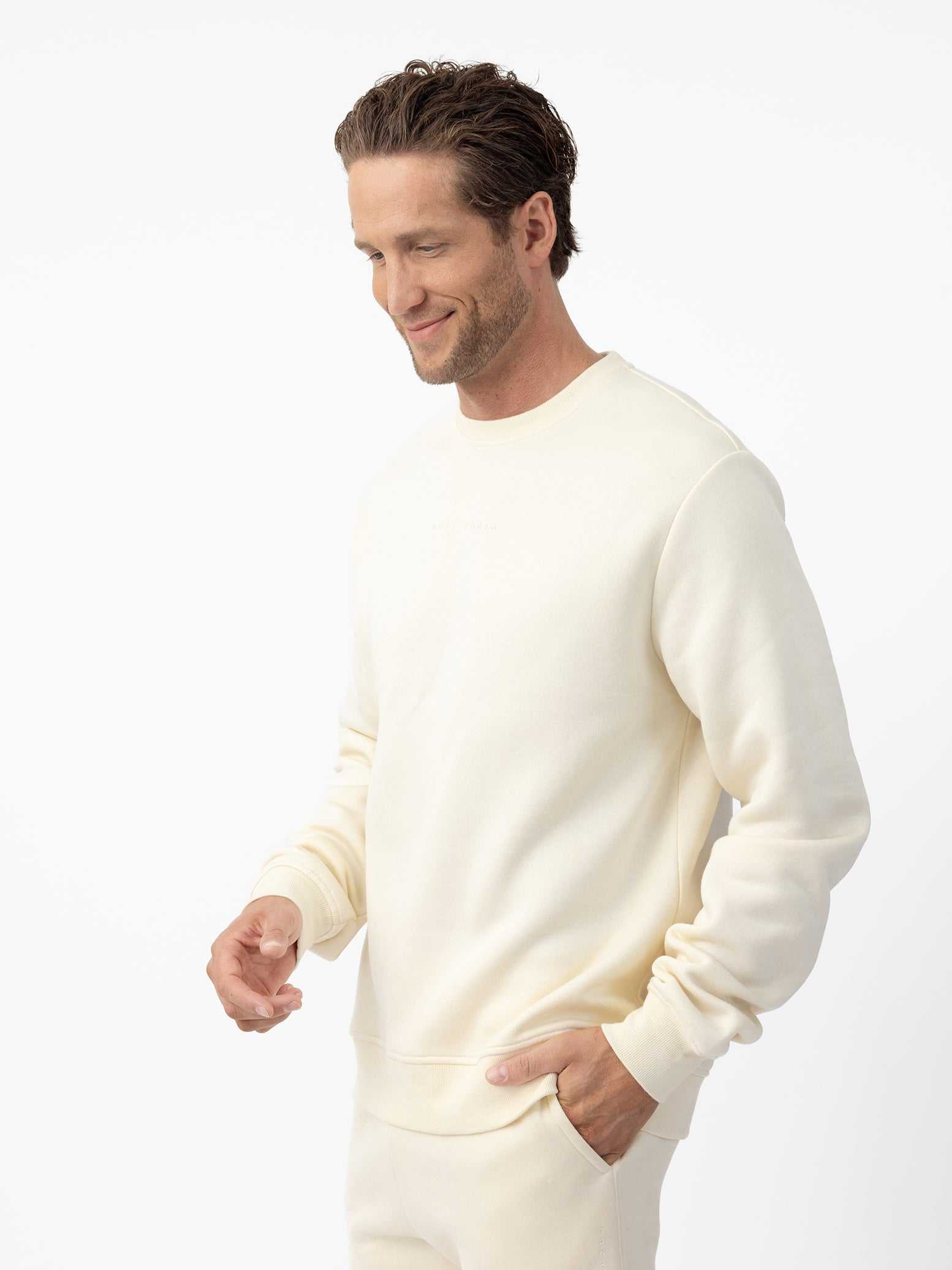 Man wearing Alabaster cityscape crewneck with white background |Color:Alabaster