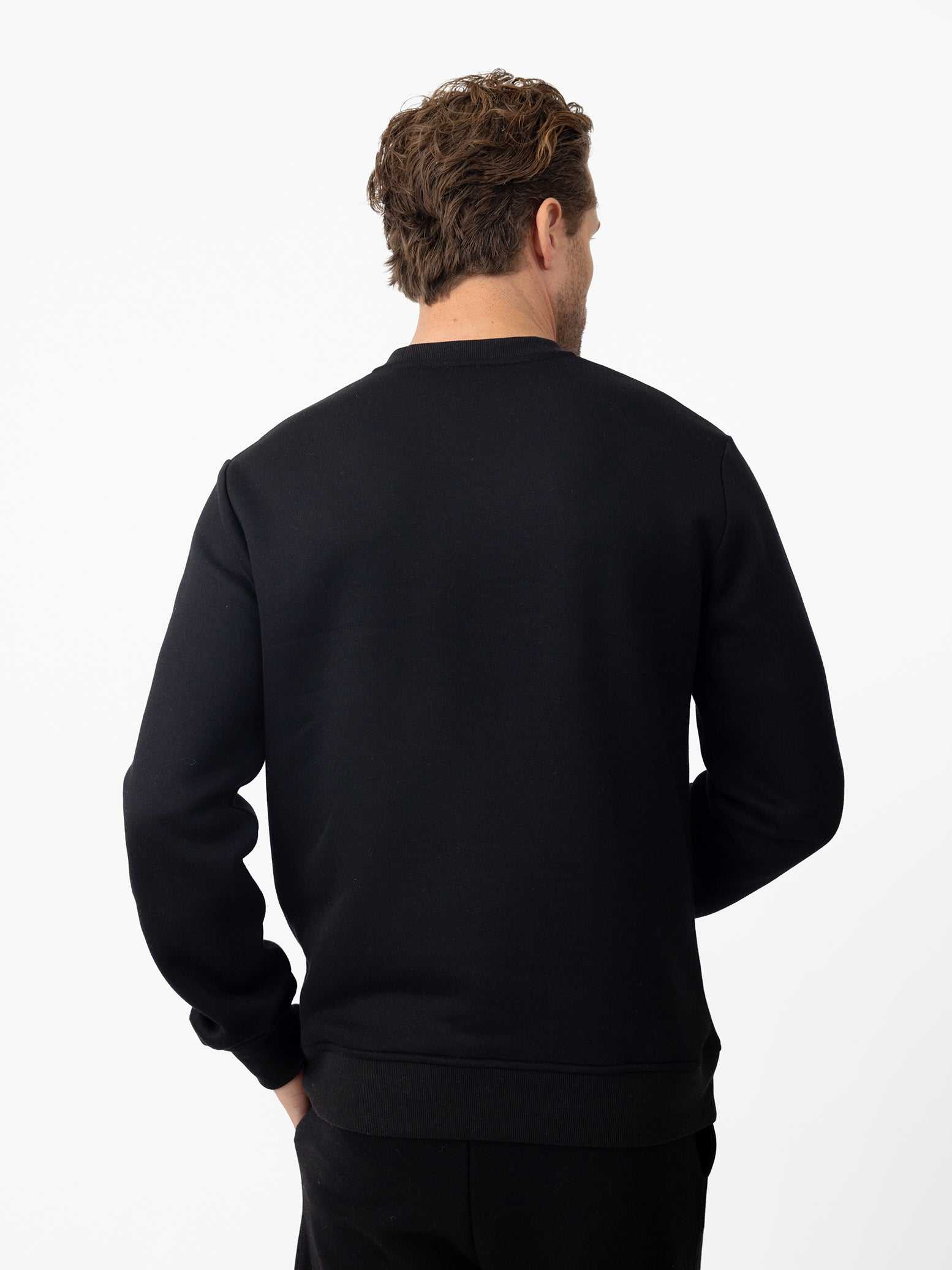 Back of man wearing black cityscape pullover with white background |Color:Black