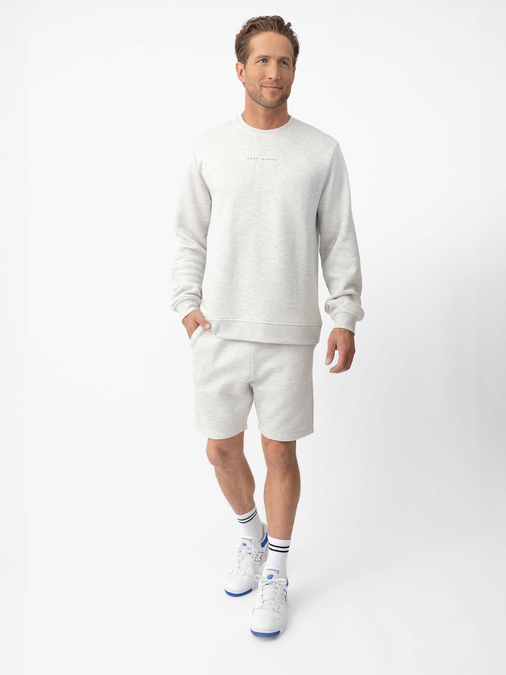 Man wearing heather grey cityscape shorts and pullover with white background |Color:Heather Grey
