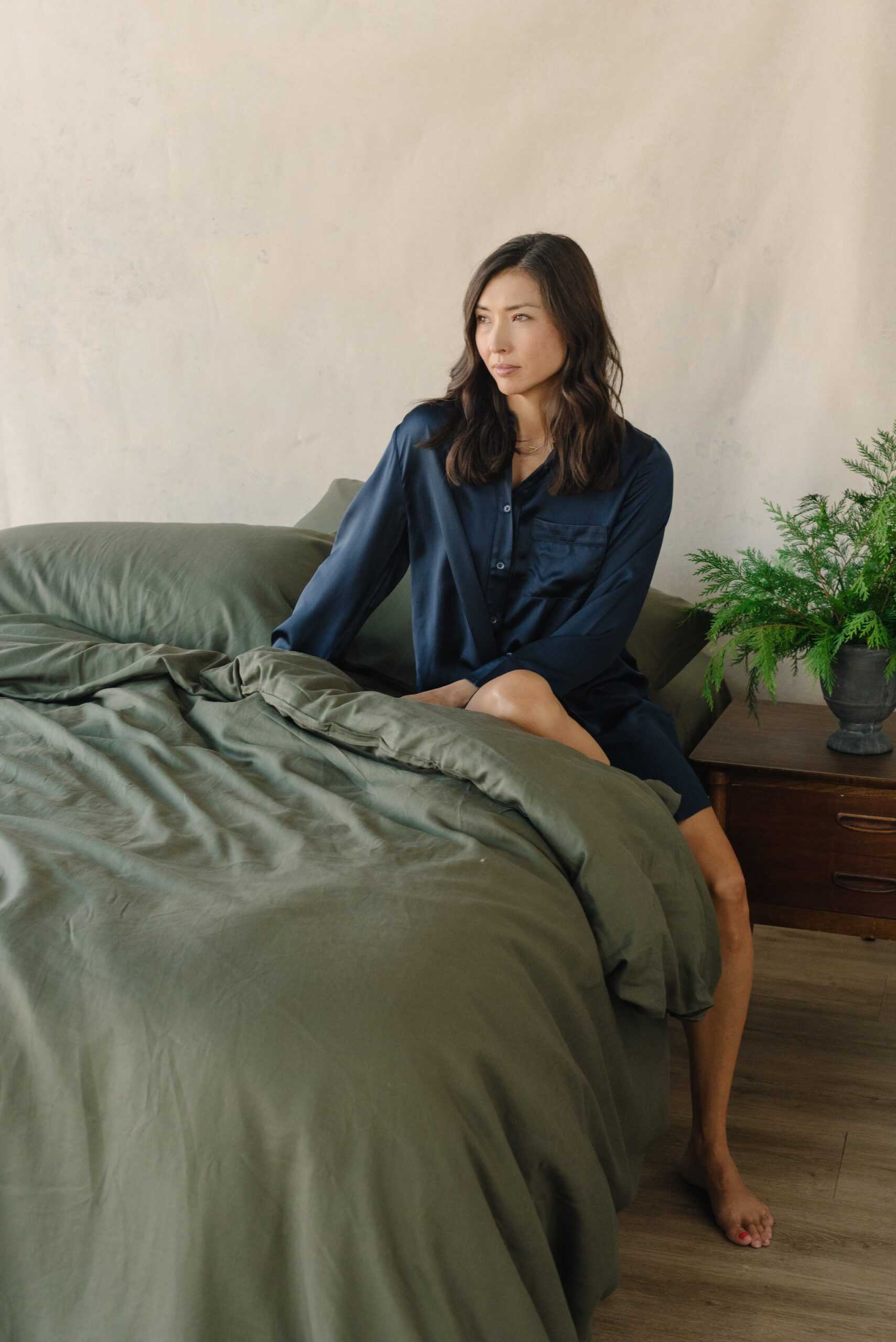 Olive Duvet Cover and comforter resting on a bed. |Color: Olive