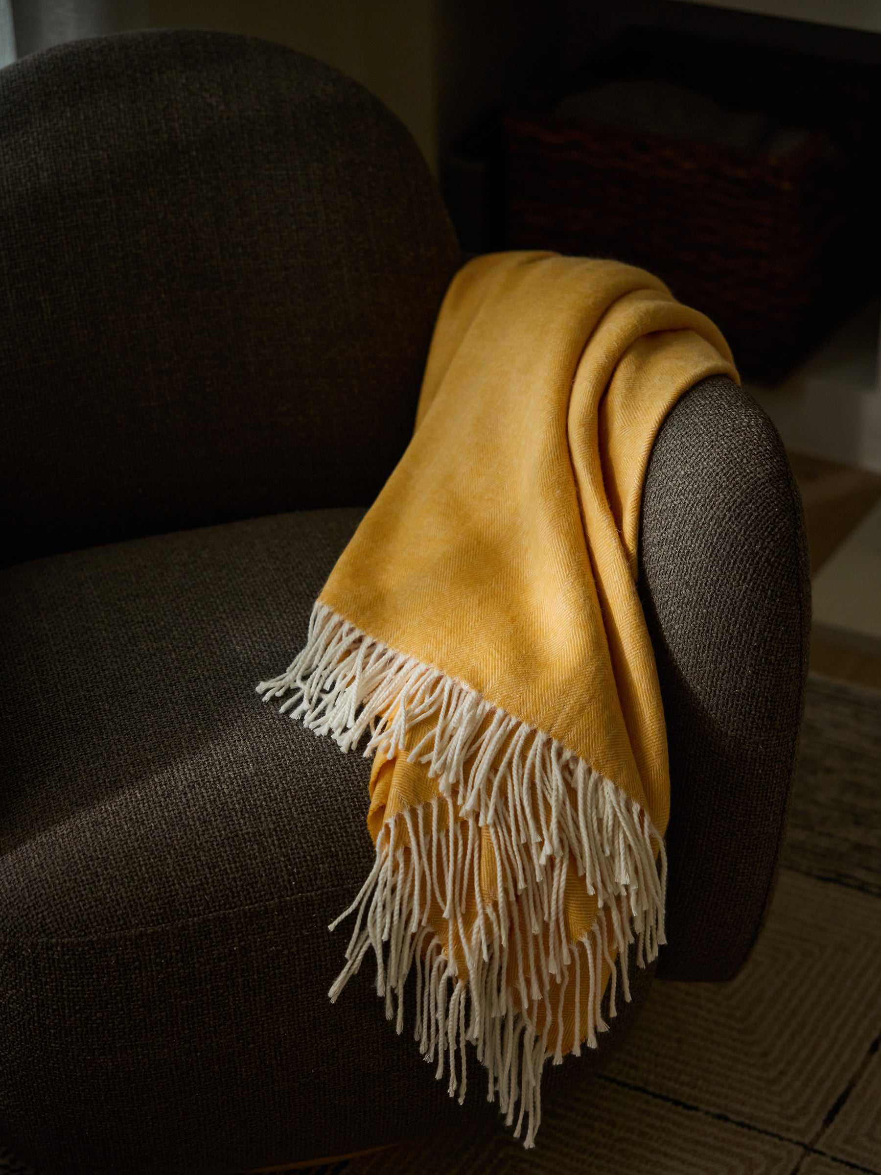 Sunflower herringbone tassel throw draped over recliner |Color:Sunflower