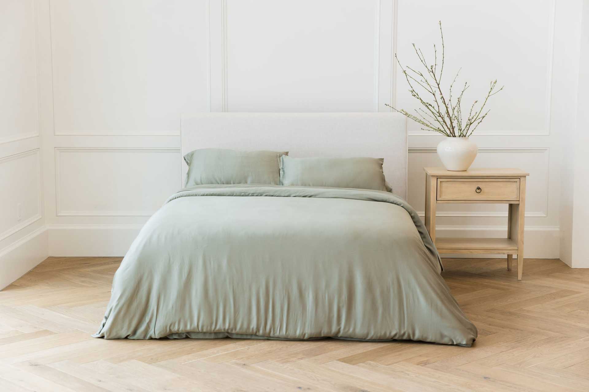 Bed with sage bedding centered in a bedroom |Color:Sage