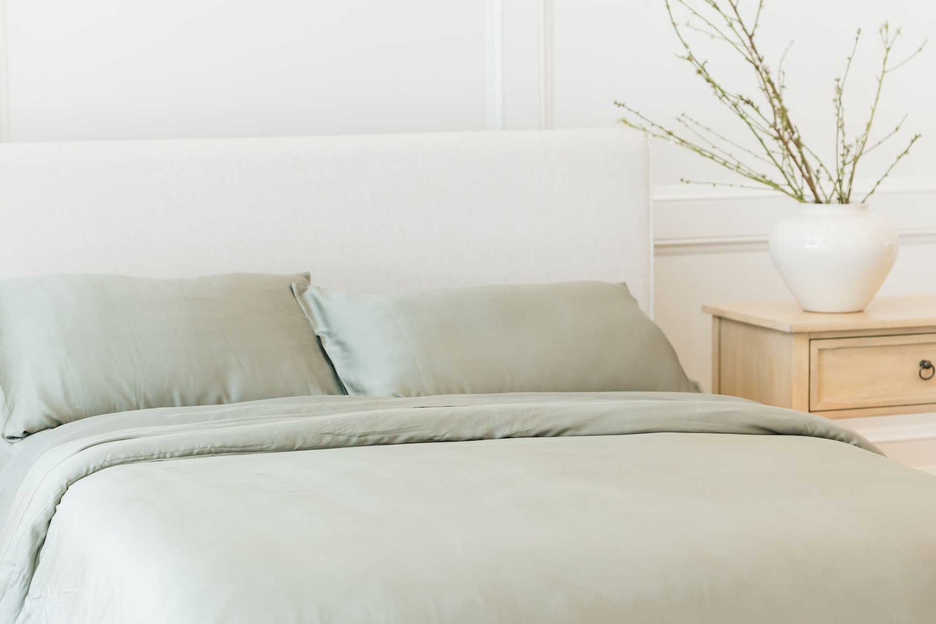 Zoomed in bed with sage bedding |Color:Sage