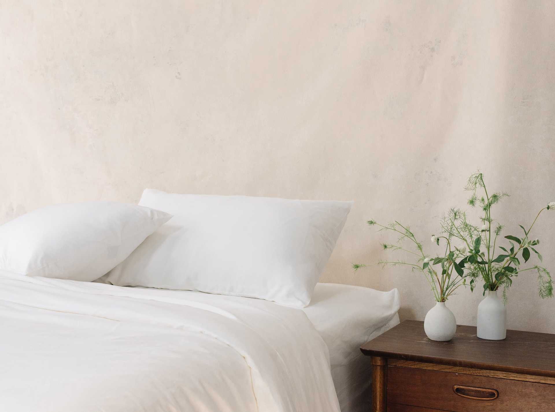 White Duvet Cover and comforter resting on a bed. |Color: White
