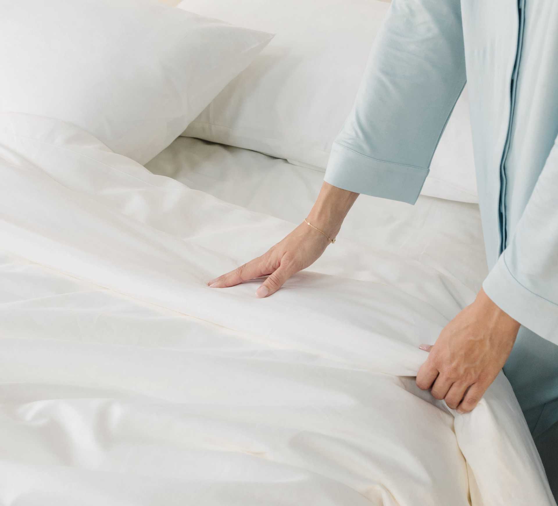 White Duvet Cover and comforter resting on a bed. |Color: White