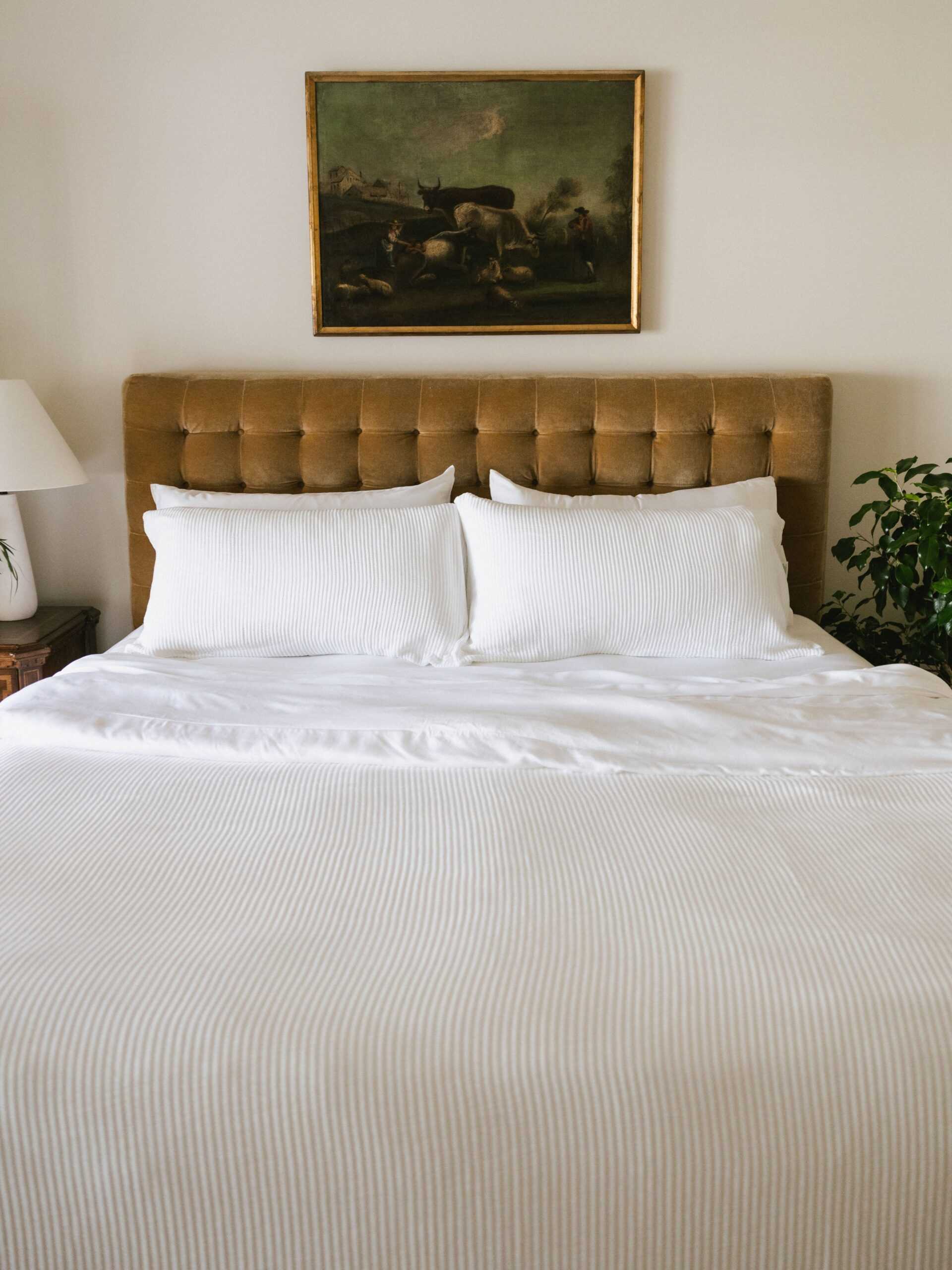 White coverlet and shams on a bed |Color:White