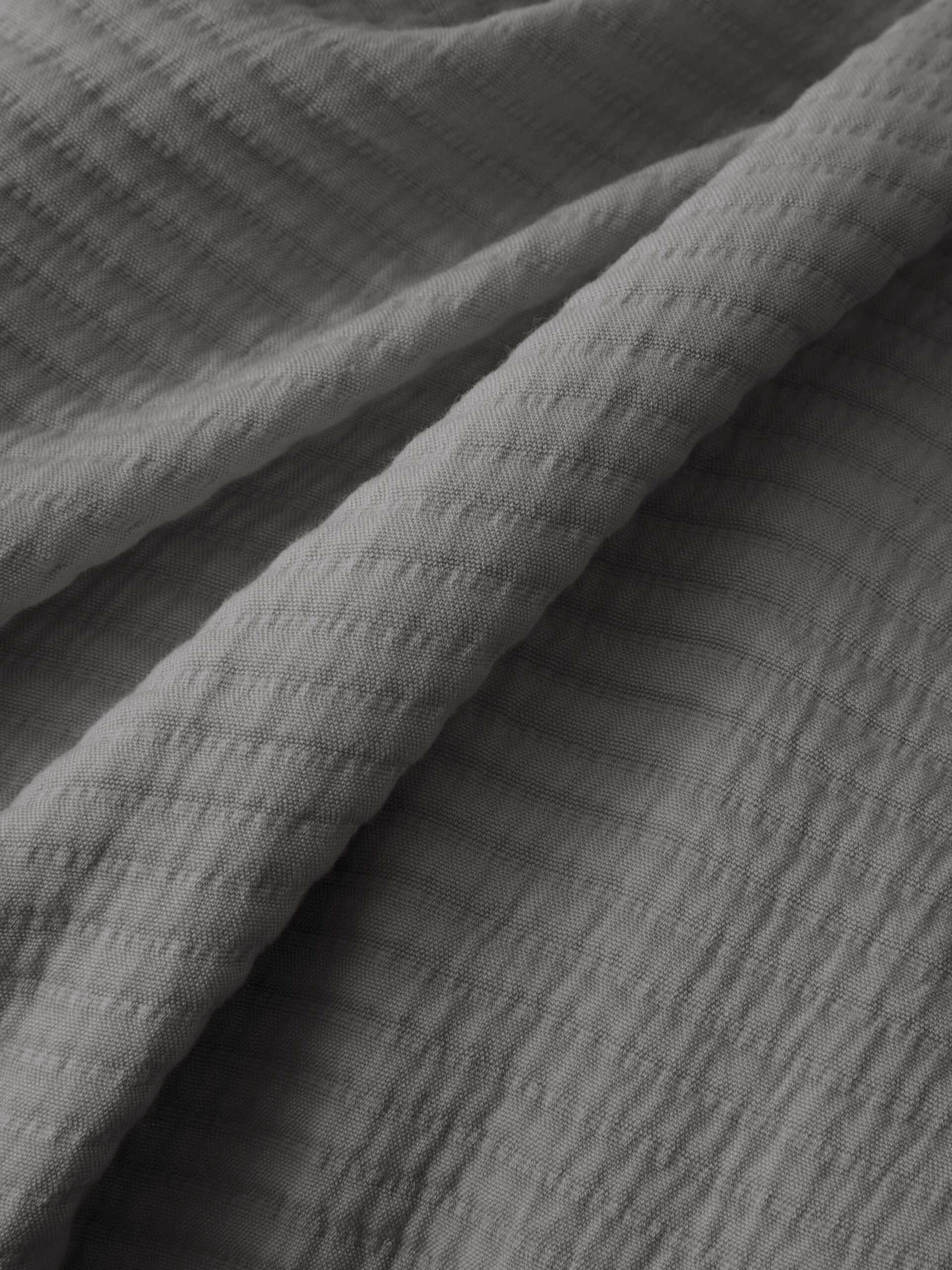 Close up of charcoal coverlet fabric |Color:Charcoal