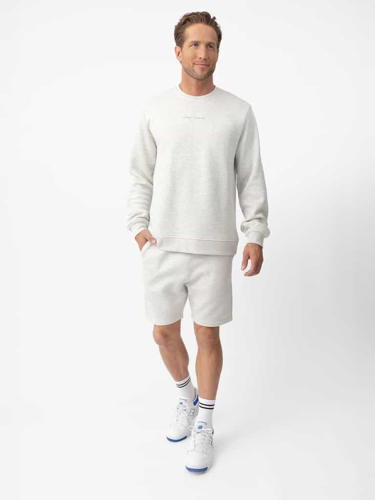 Man wearing heather grey cityscape shorts and pullover with white background |Color:Heather Grey