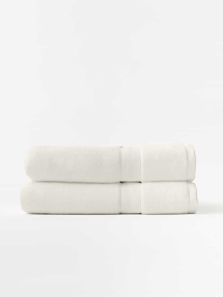 Seashell luxe bath towels folded with white background |Color:Seashell