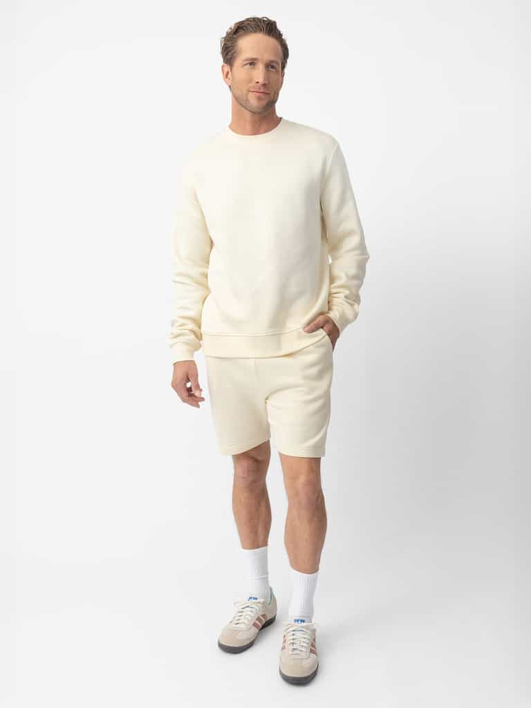 Man wearing Alabaster cityscape crewneck with white background |Color:Alabaster