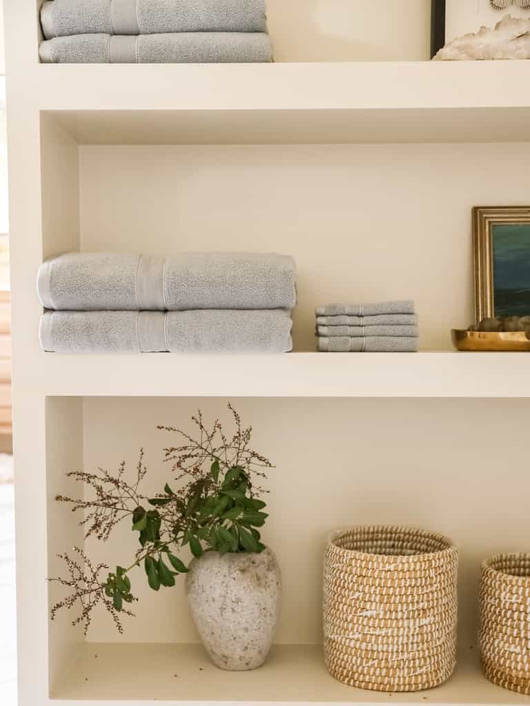 Harbor mist luxe bath towels and washcloths folded on shelves |Color:Harbor Mist