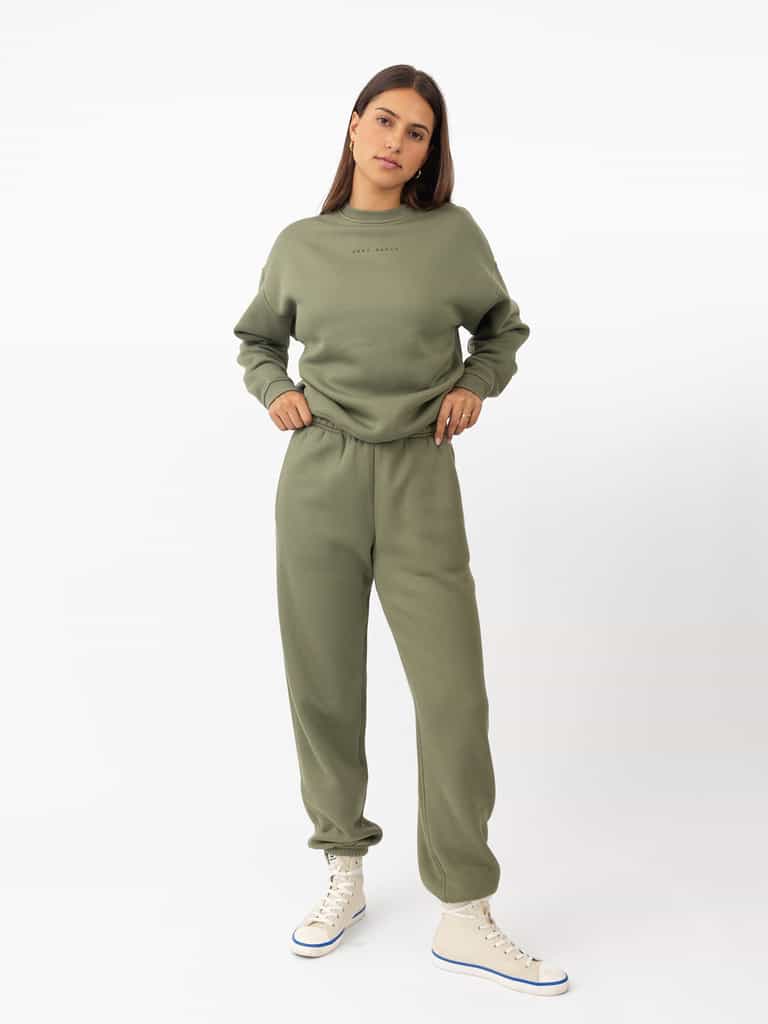 Woman wearing Juniper CityScape Crewneck with white background |Color: Juniper