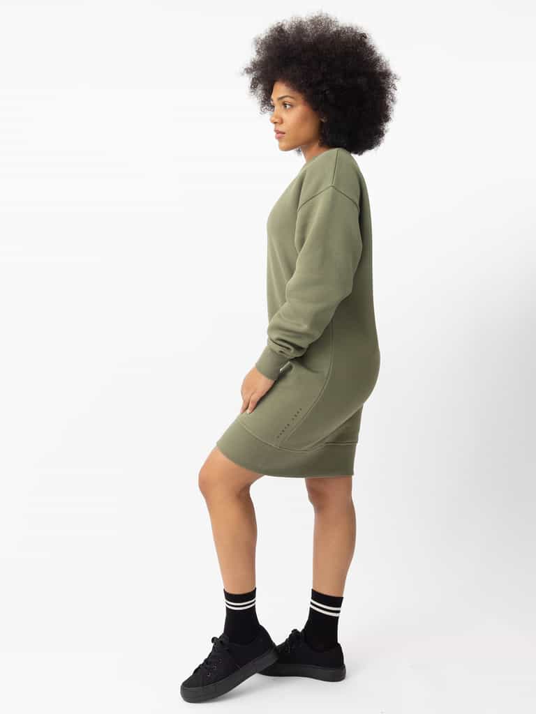 Woman wearing Juniper CityScape Crewneck Dress with white background |Color:Juniper