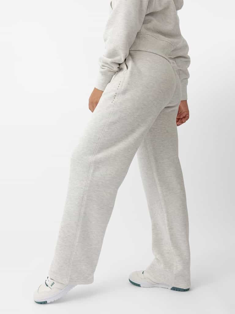 Woman wearing Heather Grey CityScape Wide Leg Pant with white background |Color: Heather Grey