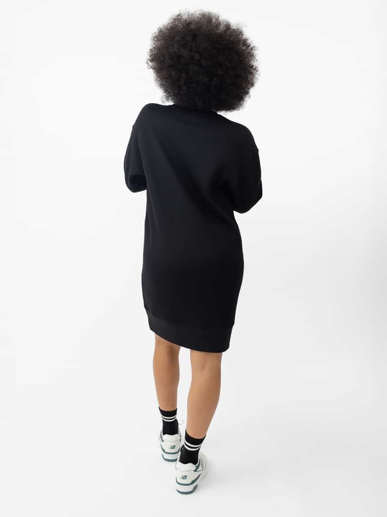 Woman wearing Black CityScape Crewneck Dress with white background |Color:Black