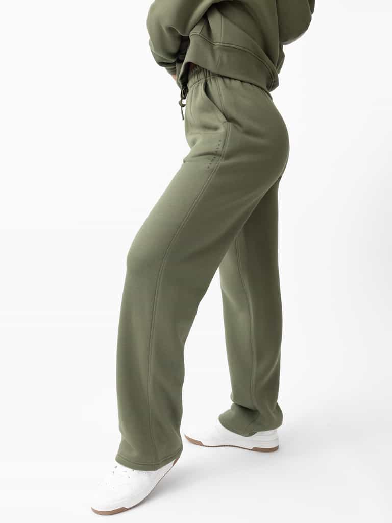 Woman wearing Juniper CityScape Wide Leg Pant with white background |Color: Juniper