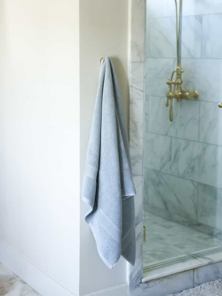 Harbor mist luxe bath sheet hanging next to shower |Color:Harbor Mist