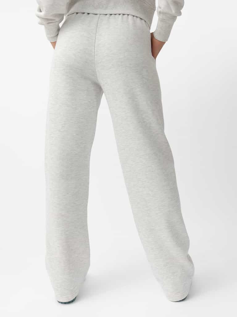 Woman wearing Heather Grey CityScape Wide Leg Pant with white background |Color: Heather Grey