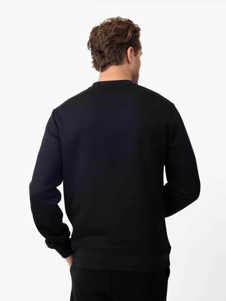 Back of man wearing black cityscape pullover with white background |Color:Black