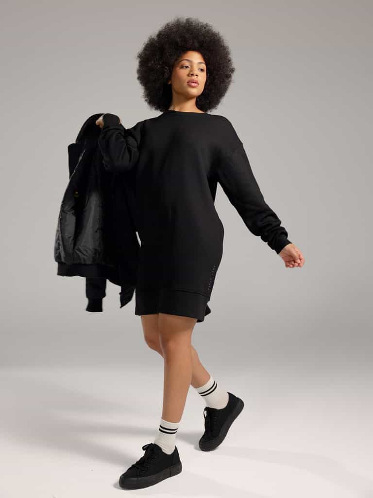 Woman wearing Black CityScape Crewneck Dress with grey background |Color:Black