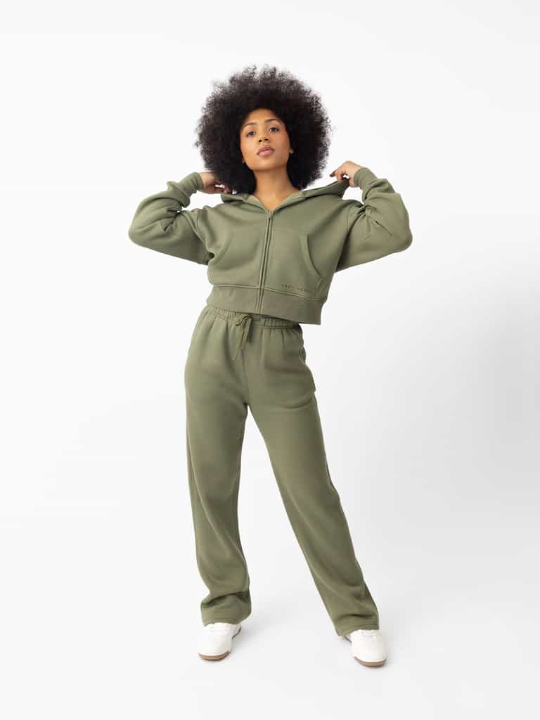 Woman wearing Juniper CityScape Wide Leg Pant with white background |Color: Juniper