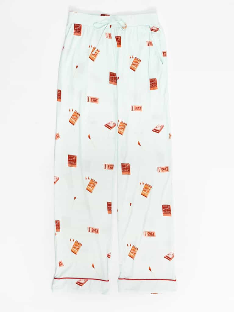 Light blue bamboo stretch-knit pajama pants from Cozy Earth's Last Chance Women's set, featuring a drawstring waist and printed brown and red books with "I Spy," complete with red piping on the cuffs. |Color:Perfect Match