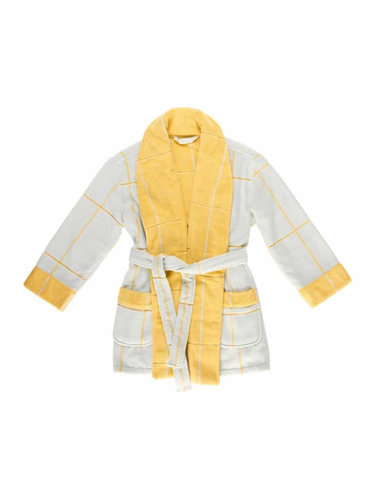 The Windowpane Resort Robe by Cozy Earth is a soft bathrobe with a light gray and yellow grid pattern. It features yellow accents on the collar, cuffs, and belt, has two large front pockets, and includes a matching waist tie. |Color:Sunny Sky