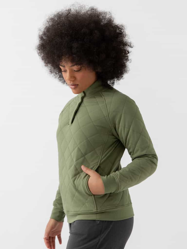 Woman wearing a green Cozy Earth Brushed Bamboo Quilted Pullover against a white background |Color:Juniper