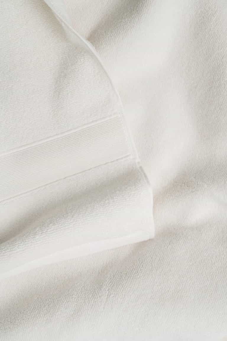 Close up of seashell luxe bath towel |Color:Seashell