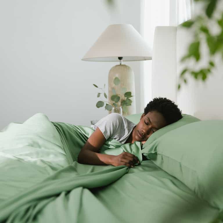 Women sleeping in fern bedding |Color:Fern