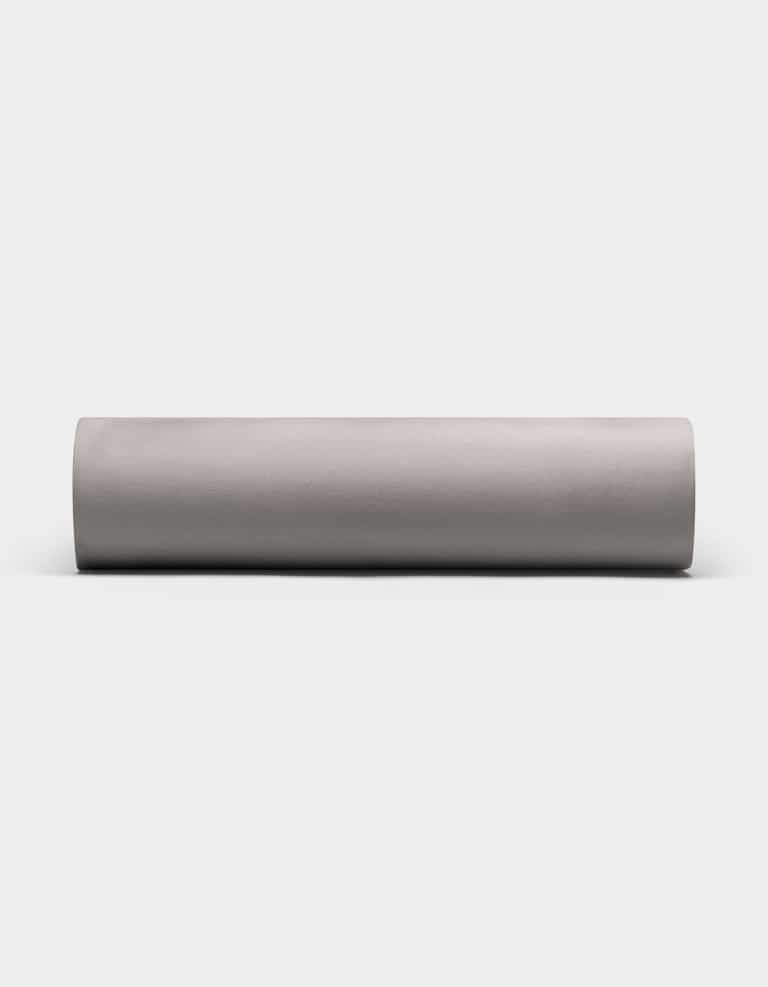 A Bamboo Fitted Sheet by Cozy Earth is displayed horizontally against a plain white background.|Color:Charcoal