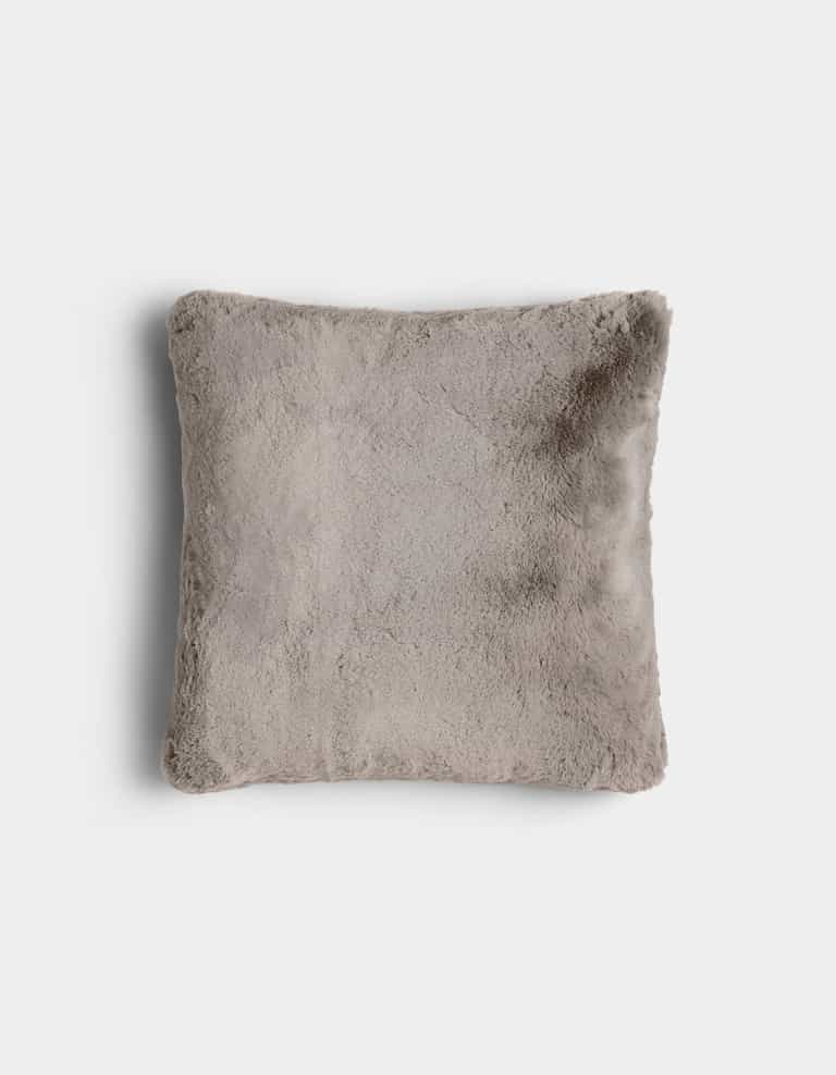 The Cuddle Pillow by Cozy Earth is a square, light gray plush pillow with a soft, fuzzy texture, displayed on a plain white background.|Color:Dove Grey |Size:20" x 20"